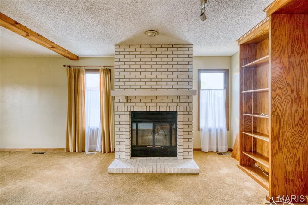 Photo of 1938 Riverwood Trails Drive, Hazelwood, MO 63031 (MLS # 26028891)
