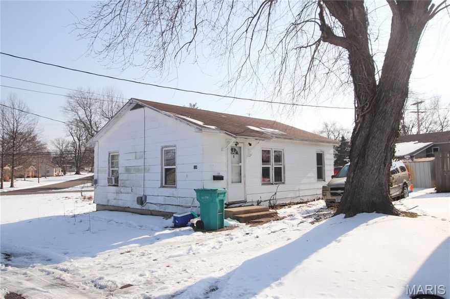 Income-producing 2 bedroom, 1 bathroom home located on a corner lot. The property was formerly improved with a second dwelling, presenting the possibility of rebuilding an additional home, subject to city approval. Ideal opportunity for investors seeking immediate rental income with potential for added value.