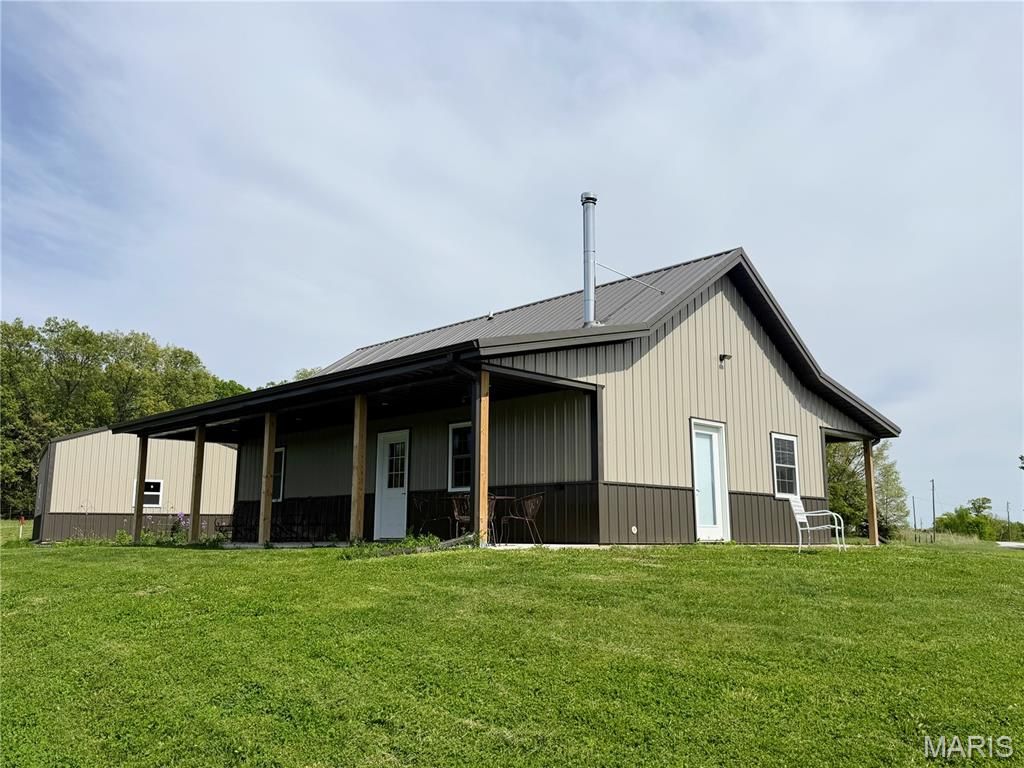 Photo of 11299 Peacock Road, Greentop, MO 63546 (MLS # 26029571)