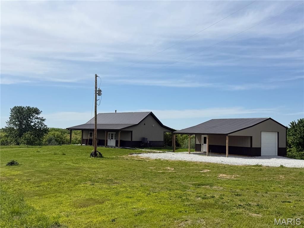 Photo of 11299 Peacock Road, Greentop, MO 63546 (MLS # 26029571)