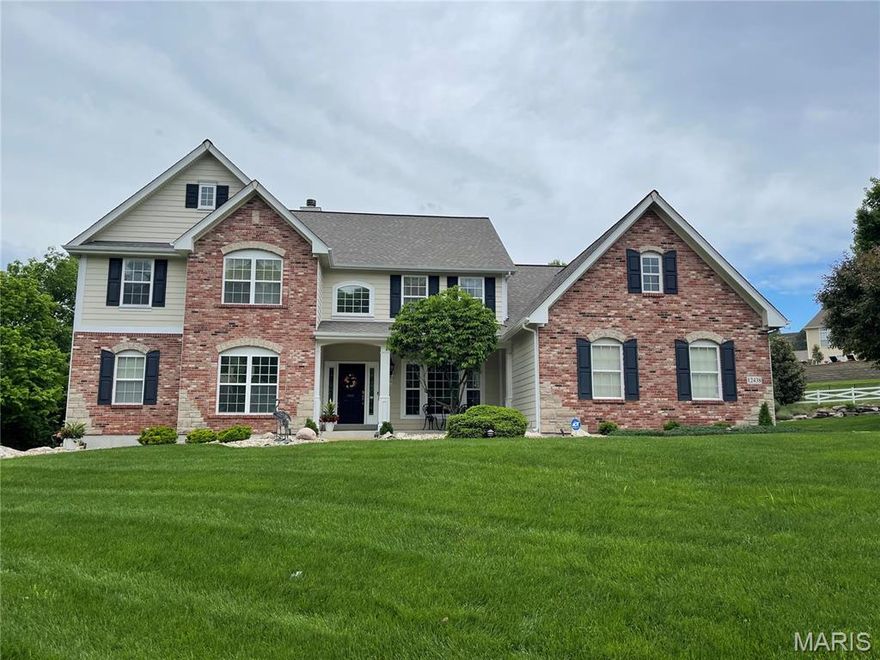 Welcome to this spectacular 5BR home in sought-after Sunset Hills, where elegance meets comfort! Step inside to beautiful h/w floors, 9ft ceilings & crisp white 6-panel doors. The gourmet kitchen is a chef's dream w/42" staggered cabinets w/crown, granite, stone backsplash, large island w/breakfast bar & Bosch SS appls w/gas range. Enjoy the cozy hearth room w/2nd f/p! The soaring 19ft great rm dazzles w/palladium windows, gas f/p & recessed lighting, while the formal dining room boasts treyed ceilings & wainscoting. A main-floor office w/crown is perfect for work-from-home & the marble foyer makes a grand impression! The main-level primary suite offers bay windows, his/hers walk in closets, spa-like bath w/dbl vanity, sep tub & shower & tile floor. Upstairs: 3 beds, 3 full baths & a loft area! The fin LL adds living space w/wet bar, 5th BR, full bath, storage, dual HVAC sys (new in 2019) & 2 water heaters. Enjoy outdoor living on the maint-free deck w/stone pillars & lighting system!