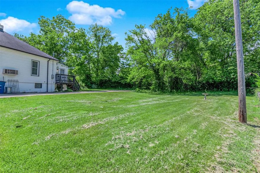 Ready to build on this double lot. No need to tear down on empty portion of lot. Live in home on this lot while building on extra lot, or raze and build on extra large .33 acre lot. On a renewing street with lots of newer homes. This is the same property that is listed as a single family residential home. Motivated seller.