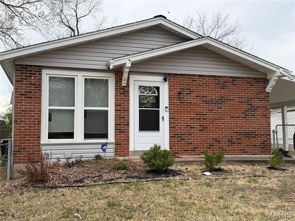 Photo of 1618 Boardwalk Avenue, Florissant, MO 63031 (MLS # 26019808)