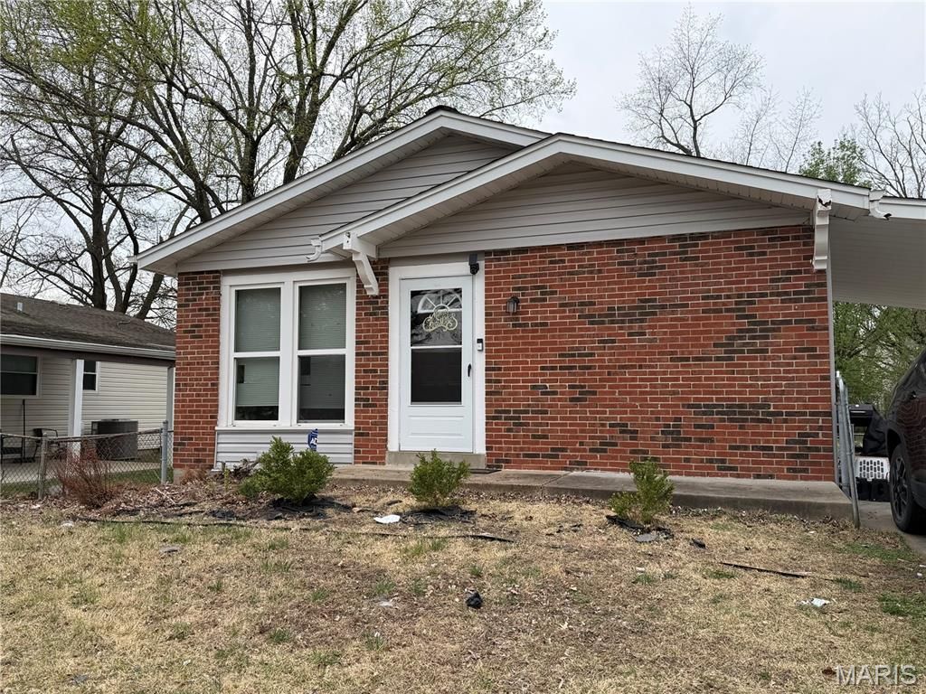 Photo of 1618 Boardwalk Avenue, Florissant, MO 63031 (MLS # 26019808)