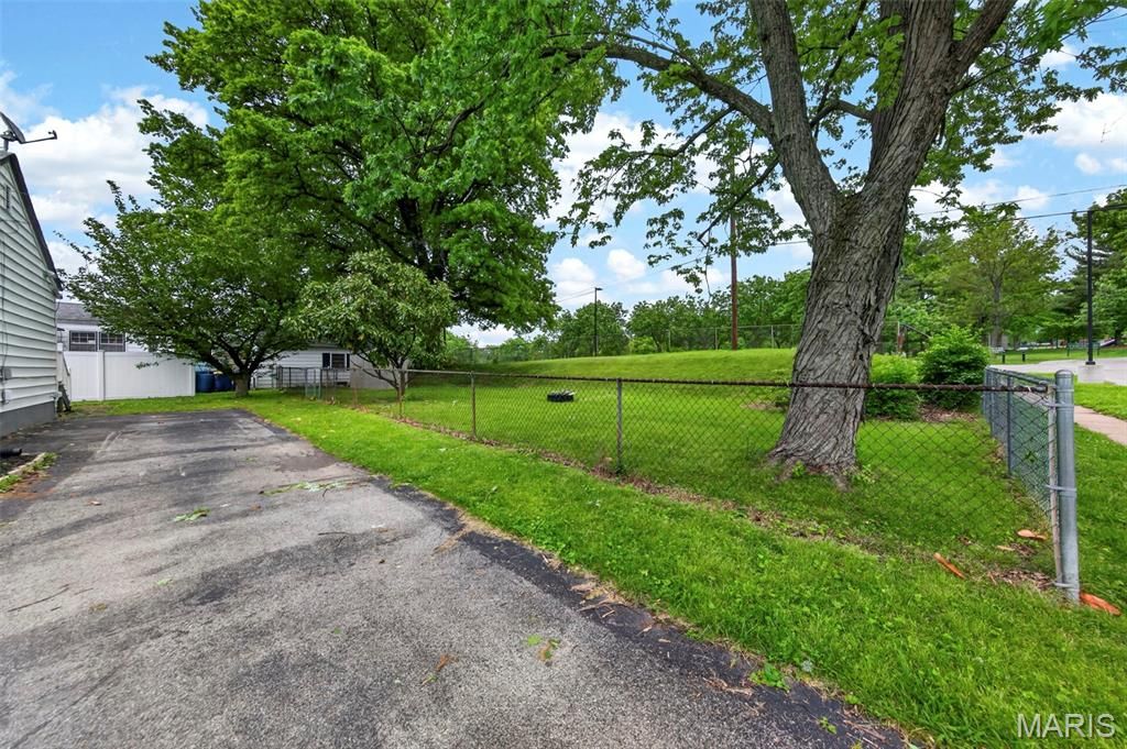 Photo of 10732 Saint Francis Lane, St Ann, MO 63074 (MLS # 26025507)