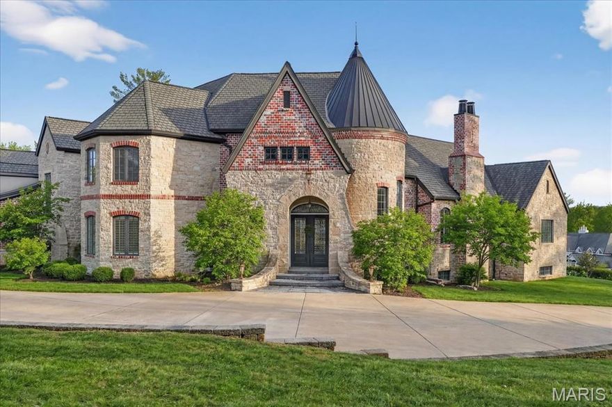 If expansive space and sustainable living are at the top of your list, this extraordinary estate delivers. Offering over 9,300 square feet of living space on 3 acres in the heart of Ladue, the home is thoughtfully designed for both everyday living and multi-generational needs, including an integrated in-law suite. Energy efficiency takes center stage in this exceptional EPA Indoor AirPlus Qualified Home, thoughtfully engineered for both sustainability and superior indoor air quality. Solar panels harness renewable energy to meaningfully offset utility expenses, while an advanced geothermal heating and cooling system delivers remarkably efficient, even-temperature comfort year-round. Complementing these systems is a water filtration system that supports a cleaner, healthier living environment. Together, these high-performance upgrades create a home that prioritizes sustainability, cost savings, and elevated everyday comfort — a rare combination of environmental responsibility and refined living. A grand entry hall welcomes you with a dramatic two-story curved staircase. The wood-paneled great room serves as the heart of the home, showcasing soaring ceilings, a fireplace, and French doors opening to the patio. The formal dining room easily accommodates large gatherings, while the expansive kitchen impresses with abundant cabinetry, a center island, oversized walk-in pantry, and a Butler’s pantry/prep kitchen. The main-level primary suite features a generous walk-in closet and a spacious bath with separate vanities and dual water closets. Positioned on the opposite wing of the home, the main-level in-law suite is thoughtfully designed with its own private kitchen, ensuite bath, walk-in closet, and dedicated thermostat. Handicap-accessible and exceptionally well-equipped, it provides comfortable, independent accommodations ideal for extended family or long-term guests. The second floor features three ensuite bedrooms and a generous bonus room that can serve as a sixth bedroom. The finished walk-up lower level is designed for entertaining, complete with a wine cellar and tasting room, game room, recreation room, two bathrooms, and additional kitchen and laundry. A four-car garage provides ample space for vehicles and storage, completing this exceptional Ladue property.