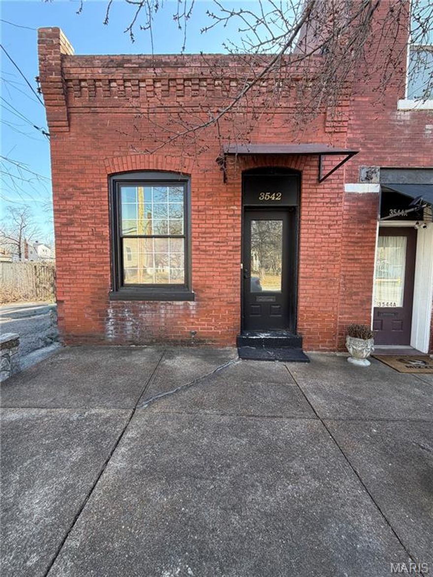 Versatile commercial office opportunity in the heart of Maplewood, a vibrant St. Louis area. Suite offers 725 SF with a beautifully finished studio-style layout with three large rooms and an additional powder room and opens to a shared fenced yard—perfect for blending business and lifestyle.  The middle room has beautiful paneling and a pocket door.  This space would be a great art / photography studio or a professional services firm.  This suite is available to be combined with a neighboring suite with approximately 1,300 SF, including 1,020 SF on the main level plus a dedicated basement room, private office, open area ideal for cubicles or reception, a powder room, rear kitchenette, and staff area, allowing for expanded operations or flexible use. The two suites each have their own entrances but also have an interior connection. Ideal for professional services, creative studios, or boutique office/retail concepts. Situated in a bustling community with close proximity to retail, dining, and entertainment hubs.  Modified Gross Lease.  Tenant pays gas and electric utilities, and groundskeeping.