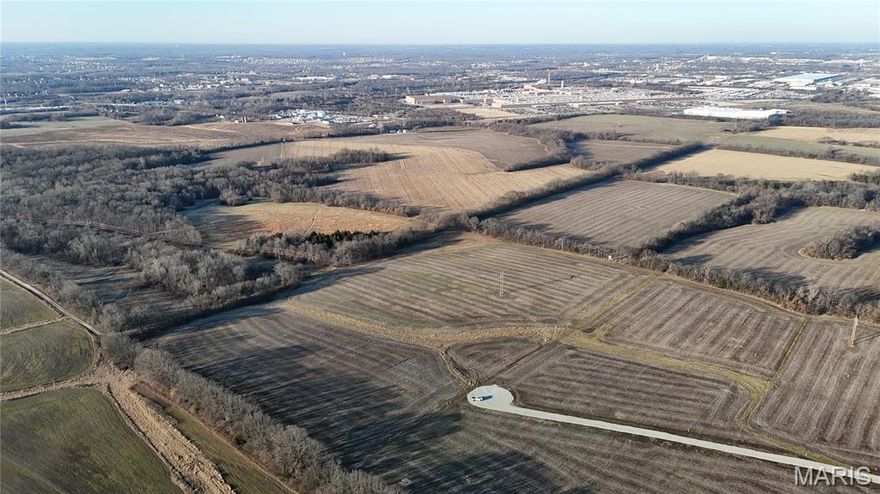 22.6 acres of flat/gently rolling land currently being farmed. Farm is only minutes away from GM and Wentzville. Would make for an excellent residential development or future equestrian compound. Property provides an investor a great place to park 1031 exchange funds for future resale/development. This property lies in Unincorporated St. Charles County. Come see the potential in this great property.