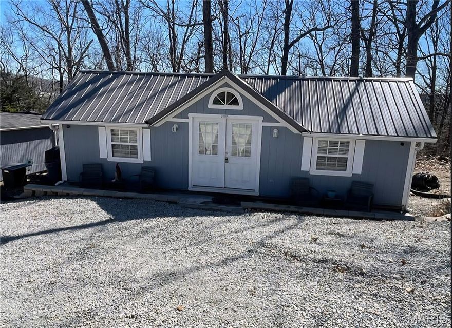 Cabin Retreat on Two Large Lots – Move-In Ready with Room to Expand!

Enjoy your own getaway with this charming 14x32 cabin built in 2021, sitting on two spacious lots with plenty of room to expand. The cabin sits on a solid concrete slab and features a split-system unit for both heating and cooling, making it comfortable year-round.

Inside, the property comes fully furnished, including all furniture and a TV, with most furnishings purchased in 2021 and still carrying warranties. Security and convenience are covered with Blink cameras, dusk-to-dawn lighting, and motion detectors already installed.

Outside, the property is set up for relaxing and entertaining. You'll find a fire pit and BBQ pit that stay with the property, plus a 12x28 shed for extra storage. A circle driveway with new gravel added in 2025 provides easy access and plenty of parking.

Additional features include:  
- Awning for outdoor shade  
- “Johnny on the Spot” portable restroom  
- Camper on site (project opportunity)  
- Paved road access – a big advantage for the area  

The location is ideal for recreation, being close to the beach, pool, and boat ramp. The property also offers friendly neighbors and a relaxed atmosphere, perfect for weekend escapes or a quiet retreat.

If you’re looking for a ready-to-enjoy property with space, privacy, and room to grow, this one is worth seeing!