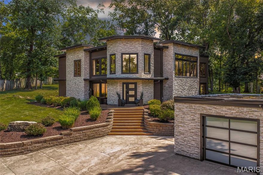 This is a true masterpiece, one of a kind. If you love contemporary art and design, this is your home. Completely renovated 4 bed 3.5 bath modern home in the beautiful Sugar Creek area. The sprawling park like back yard is over an acre and very private. Enter into a gorgeous 2 story foyer that leads into a sun-drenched open first level. Soaring ceilings and amazing finishes everywhere you look. The kitchen is a chefs dream with stainless steel appliances, farmhouse sink, and a giant island and eating area. The living room has a two-story ceiling, gas fireplace, and a wall of glass that opens to the outdoor patio. The master is great, but the master bath belongs in a five-star resort!!! The back yard is an entertainers dream with a stone fireplace, built in fridge and gas grill. Upstairs you have three large bedrooms, an open living room area and an office. This home is perfect for a family, entertaining, or just sitting in and admiring, you have to see this one to believe it.