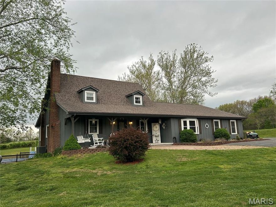 Pristine ranch estate on 10 acres of beautifully cleared land! 

This exceptional property is perfect for animal pasturage or simply enjoying the peaceful, pastoral setting. The large attached garage provides convenient access to the main-level laundry room for everyday ease.

Inside, you’ll find an open great room featuring vaulted ceilings with exposed beams, creating a warm and inviting atmosphere. The dining area is highlighted by a charming bay window, and stunning wood floors run throughout the main level. A striking stone fireplace with a gas insert serves as the centerpiece of the living space.

The kitchen is well-equipped with two ranges, making it ideal for cooking, entertaining, or large gatherings.

The spacious primary suite offers a private retreat with a sitting area, built-in shelving, a large walk-in closet, and a luxurious en-suite bath featuring an oversized jacuzzi tub, separate shower, and dual vanity.

The walkout basement opens to an expansive deck with an above-ground pool seamlessly integrated into the design — perfect for relaxing or entertaining.

In addition, the detached garage is a standout feature, complete with a separate industrial kitchen and its own HVAC system, half bathroom, offering incredible flexibility for hobbies, business use, or entertaining.