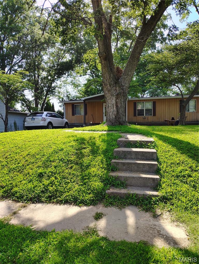 Photo of 211 N Messmer Street, Scott City, MO 63780 (MLS # 26041881)