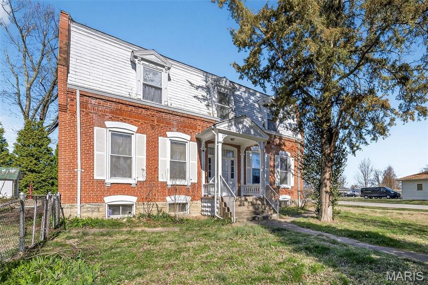 “Historic charm, generous space, and a rare double-lot setting in the heart of St. Peters.” Built in 1880, this spacious 1.5-story home offers a rare opportunity to own a property with more than a century of history in the heart of St. Peters. With approximately 2400 SF of above-grade living space, the home features a flexible 5-bedroom layout, including a main-floor primary suite and four additional bedrooms on the second level. 
Situated on an impressive 18,295 sq ft lot — nearly half an acre and spanning the feel of two city blocks — the property offers an uncommon amount of outdoor space for this area. The large lot provides room for future improvements, expanded outdoor living, or simply enjoying a spacious yard. Recent improvements include new carpet in the living room, primary bedroom, sitting room and hallway, along wit LVP flooring in the foyer and kitchen/breakfast area. The kitchen features 42-inch cabinets with crown molding and glass front accents. Important infrastructure updates include stack replacement and sewer line replacement. The home also offers an enclosed 3 seasons patio for entertaining & enjoyment and an unfinished stone basement providing additional storage or potential future use. So many future possibilities! The garage structure on the property will likely need to be removed. This property is being sold strictly AS-IS, with the seller to make no repairs or inspections. With its historic character, generous bedroom count, and rare lot size, 16 Maple St presents a unique opportunity to update a home with over 140 years of story while enjoying space rarely found in the area. Could be perfect for Air BnB! Water heater 2018 Roof replaced 2020. WIndows replaced 2019. Sewer line replaced 2025. LL carpeting and LVP 2026