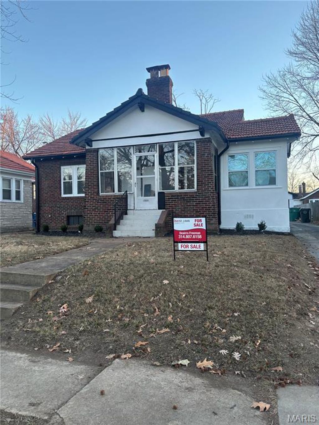 Photo of 7618 Springdale Drive, Pasadena Park, MO 63121 (MLS # 26028903)