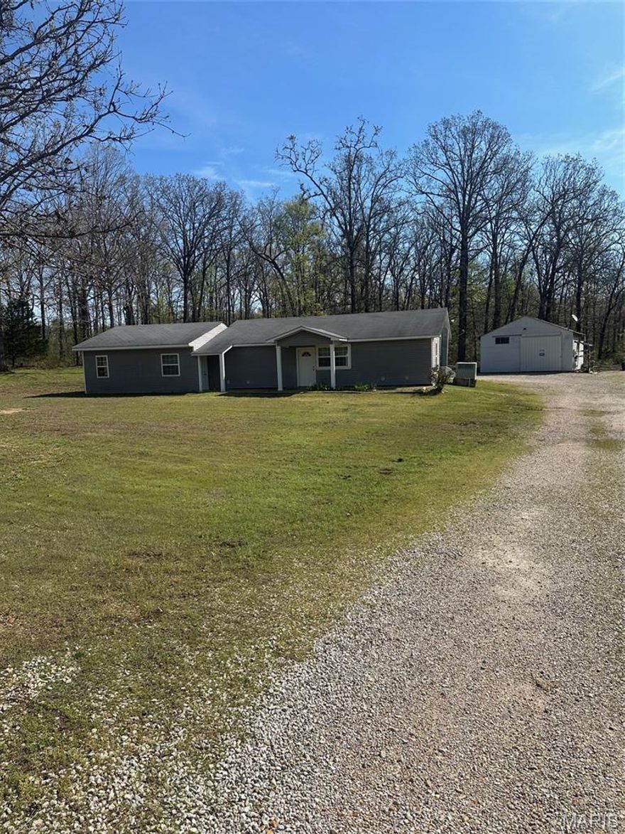 Remarkable Home within 5 minutes of Doniphan! This 3,(possibly 4) bedroom, 2 bath home on 5 acres of land. the home has 2,064 sq ft of lining area. Open floor plan, large kitchen, living room, dining room and family room. one potential bedroom could be used as an office as well. Large utility room with separate walk-in pantry. Outside you will find a firepit and a large yard, with garden spot. Also included with the property is a large shop building, with electric, air conditioning and gas heat. There is an additional small metal storage building on the property. This home is move-in ready. Call today for your showing. OWNER WILL CONSIDER ALL REASONABLE OFFERS!