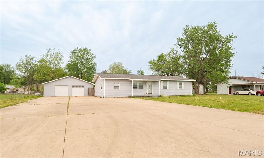 Charming 3 bed, 2 bath home on James Ward Dr. featuring a spacious, well-designed floor plan ideal for comfortable living and entertaining. Enjoy a large driveway with plenty of parking, plus a detached 2-car garage that doubles as a workshop - perfect for hobbies, storage, or projects. The fully fenced yard offers privacy and room to roam, complete with an above-ground pool for relaxing on warm days. Inside, natural light fills the living spaces, creating a bright and inviting atmosphere. Step outside and take in the beautiful agricultural views that provide a peaceful, country feel while still enjoying the convenience of a functional, move-in-ready home.