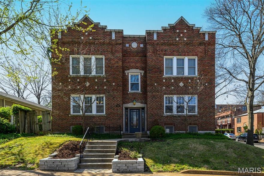 Welcome to effortless, upscale living in the heart of Clayton! This immaculate, light-filled ground-level condo is set within a quiet charming brick building on a corner lot that exudes beautiful historic charm. Highlighted by rich hardwood floors, elegant crown molding and a lovely fireplace, the open and bright 1,328+ sq. ft. layout includes a front sunroom, living room and a large formal dining room. Two spacious bedrooms, including one with a delightful attached sunroom, provide a versatile space perfect for a home office, a bright sitting area or a sun-filled retreat for plants and relaxation. The kitchen is thoughtfully designed with abundant custom cabinetry, a full stainless steel appliance package, granite countertops and plenty of storage. In-unit laundry, a rare convenience, adds to the ease of living. A back entrance leads to an off-street parking pad at the rear of the building and additional storage is available in the basement. Part of a 4-unit building, 3 of which are owner-occupied, this unit currently has wonderful tenants on a month-to-month lease who are happy to stay or vacate at closing. Located in the sought-after DeMun neighborhood, this condo offers exceptional walkability where you're just a short walk from coffee shops, acclaimed dining, wine bars, boutique shopping, yoga studios and everyday essentials.