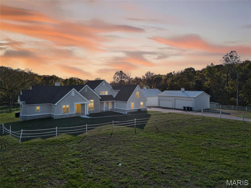 WOW! WILDWOOD ESTATE! This 1.5 story sprawling home on 6.5 acres can be yours! With 5 bedrooms (Primary on main level) and 3.5 baths, this has enough room for everyone! Backing up to thousands of acres of Nature Reserve and Greensfelder Park...you can rest assured of beautiful landscapes all year round! The brick/stone on the front elevation is a grand sight pulling up to your home as you may catch deer running along your fenceline. Main floor has a spacious family room, eat in kitchen, mud room, office (bedroom), half bath, laundry room and the grand Primary suite with THE BEST VIEWS. Upstairs are 3 secondary bedrooms (one with a full bathroom) and another full bath in the hall. Expansive LL is partially finished but is a blank canvas for whatever you want! Outside on the grounds there is a beautiful 6 stall horse barn w/water and electric. A separate 4 car garage w/electric and 12 ft ceilings. Easy to show and can close quickly.