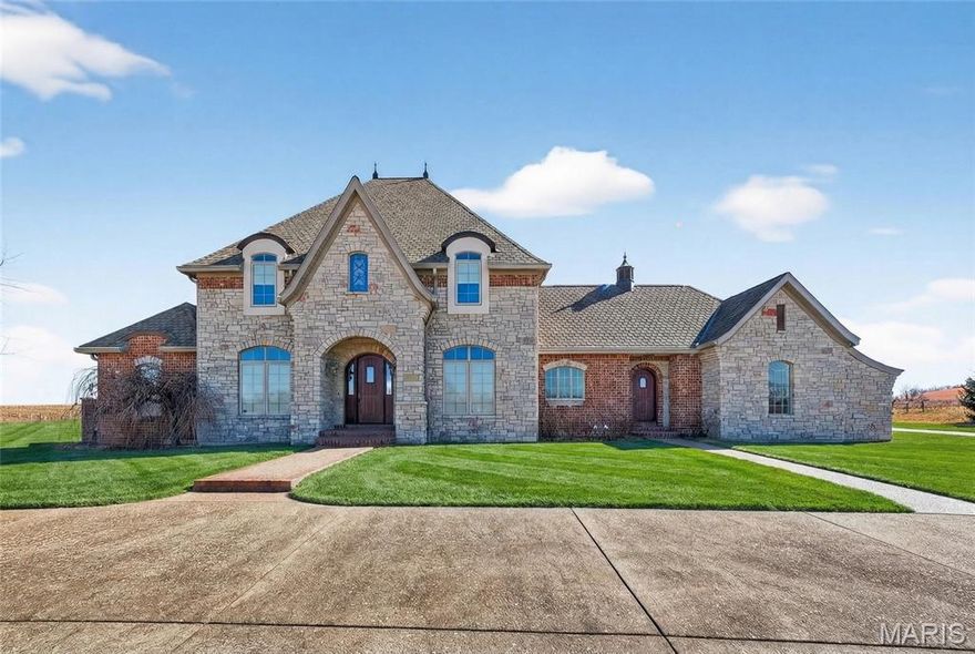 In my opinion THE BEST property in Elsberry w/ 20 acres of sprawling land(approx. 100 more acres available), a beautiful home that represents luxury living at it's finest including an elevator that reaches all 3 floors. Beautiful views from every direction with fenced pastures and panoramic views. The long driveway leads you to incredible views, this property has been in the family for many years. As you approach the property w/ a circle drive you will notice the stone front elevation w/ brick on all 3 other sides, a new arch. roof done in 22, geo thermal, 3 HVAC, 2 hwh, the entire home is wheelchair accessible with an elevator that reaches all 3 floors. This unique home has 12 doors leading to the exterior on the main level alone as well as a finished walk out LL that is incredible. There is even an in-ground pool on the main level, the kitchen is truly a chef's delight w/ double ovens, a warming drawer, built in refrig., built in cooler, 2 dishwashers, huge island w/ seating and a beautiful bay window overlooking your private yard. The home has detailed crown molding t/o, 5 in. baseboards, custom door cases and top of the line lighting including Swarovski crystal chandelier in the dining room. The dining room and study have wood floors and detailed wood work. The great room is open to both w/ a gas fireplace. The primary suite is off of the great room and is huge and also offers a sitting room area, a door that leads to your own private deck, the primary bath has a hidden closet, large walk in closet w/ custom shelving and cabinets, large walk in shower w/ seating, large soaking jacuzzi tub and of course double sinks w/ granite counters and heated tile floors. Upstaris you will find a large loft with triple doors leading to a covered balcony that is screened, 2 large bedrooms w/ walk in closets w/ built in organizers and a jack and jill bath.
This home has so many storage rooms and closets it is incredible. It really is an incredible well built home, the seller went above and beyond with this custom built home and a lucky buyer will enjoy this home for many years to come.   

Once in a lifetime opportunity to own this unique property that also offers another listing that   Includes 3 underground limestone mines with 49 acres as well.  There is also opportunities to buy more land w/ barns, pastures and a pond. Perfect location w/ convenient access to Hwy 79 & approx. 25 minutes to HWY 70.