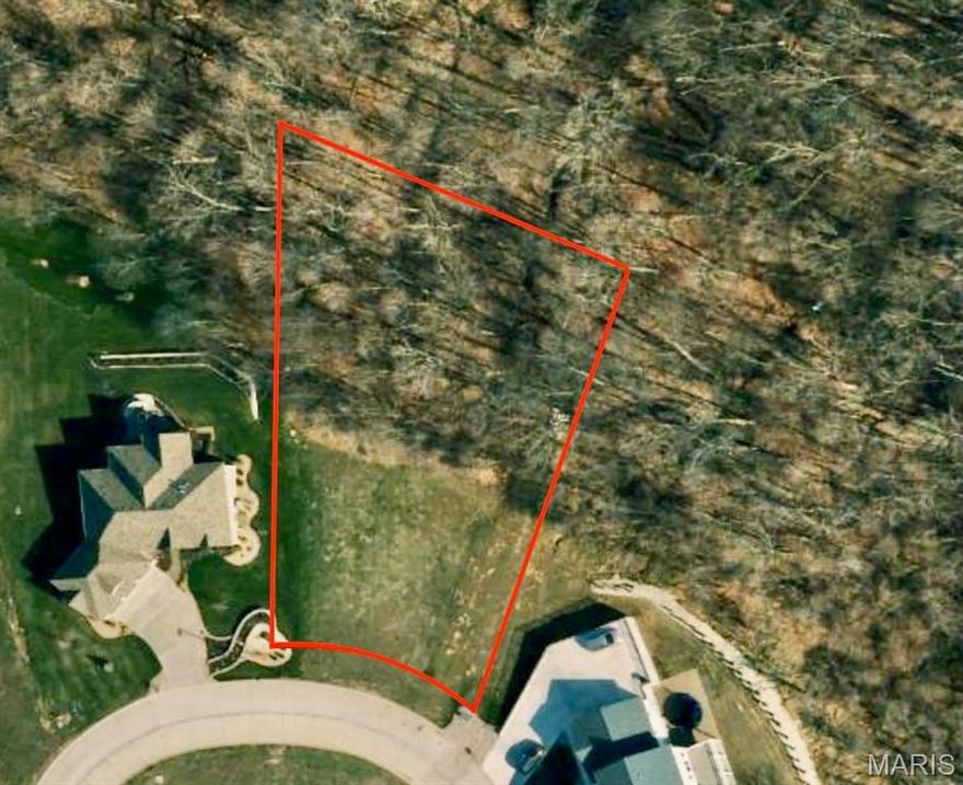 Exceptional cul-de-sac building lot in the desirable Fette Orchard Subdivision! This spacious parcel backs directly to woods, offering a peaceful natural backdrop, added privacy, and frequent wildlife sightings. Situated on Gala Drive, the lot features a generous building area ideal for your custom home, with the added benefit of limited traffic in a quiet cul-de-sac setting. Located just minutes from Hannibal Country Club golf course, Hannibal Regional Hospital, schools, and shopping, this property offers the perfect combination of privacy, scenery, and convenience. A rare opportunity to build in one of Hannibal’s most established and sought-after neighborhoods.