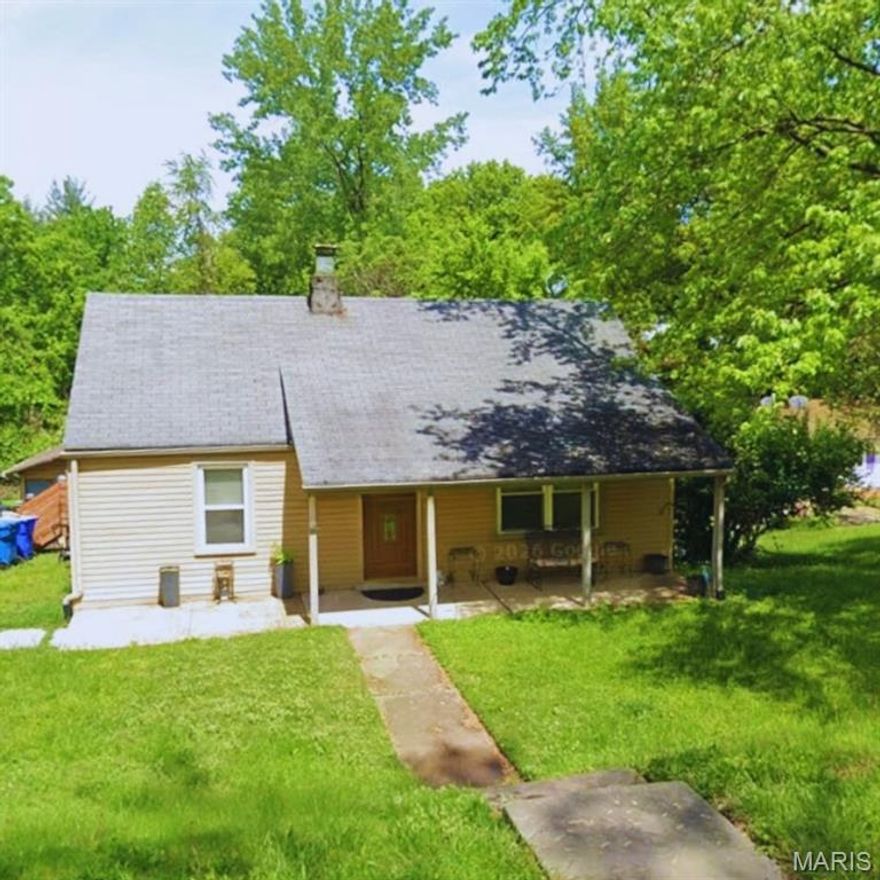Cozy 2-bedroom bungalow with 1 full bathroom and a basement offering additional storage or potential living space. SOLD BEFORE PRINT.