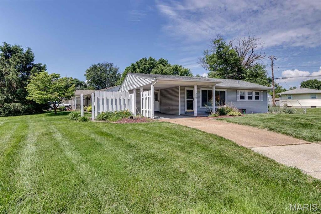 Photo of 1350 Charbonier Road, Florissant, MO 63031 (MLS # 26033454)