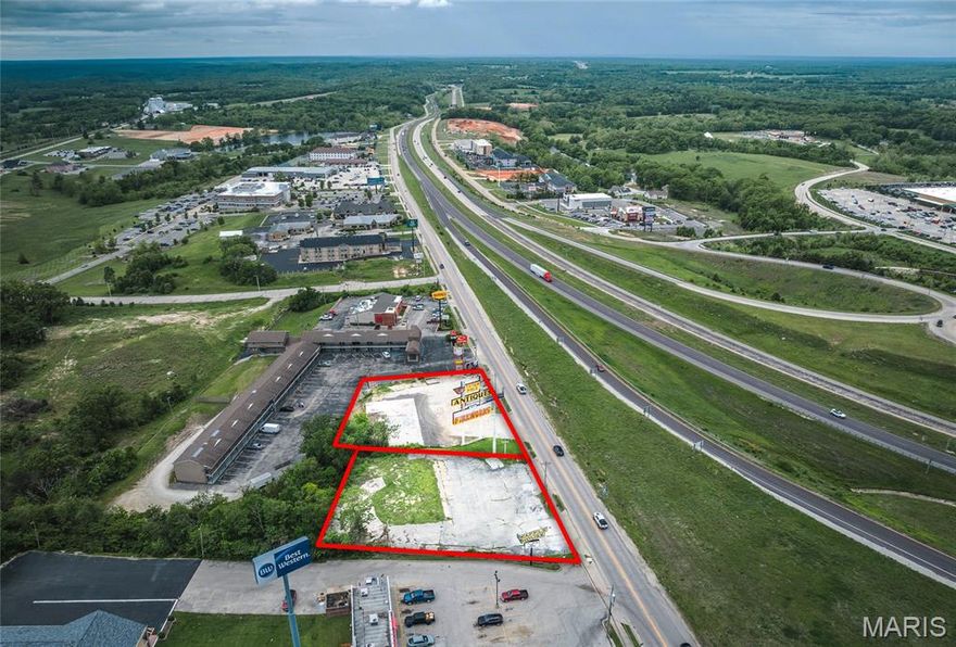 This cleared 1.076 m/l acre commercial site along Historic Route 66 is located just off I-44 at Exit 184 in Rolla, Missouri. Formerly home to the iconic Totem Pole, this high-visibility location offers excellent interstate exposure near hotels, restaurants, and the new Westside Marketplace shopping center.

Land lease options (NNN):

Entire 1.076-acre site: $14,000/month
1409 Martin Springs Drive (0.476 acres): $6,500/month
1413 Martin Springs Drive (0.60 acres): $7,500/month

Build-to-suit potential:
Ideal for national franchises or businesses seeking prime exposure with lower upfront costs than purchasing land. High daily traffic counts and proximity to interstate access make this site perfect for fast food, convenience stores, coffee shops, retail, or other consumer-focused businesses.

Surrounded by a strong mix of hotels, dining, and retail, this property provides excellent opportunity for expansion or new location development in a proven commercial corridor.