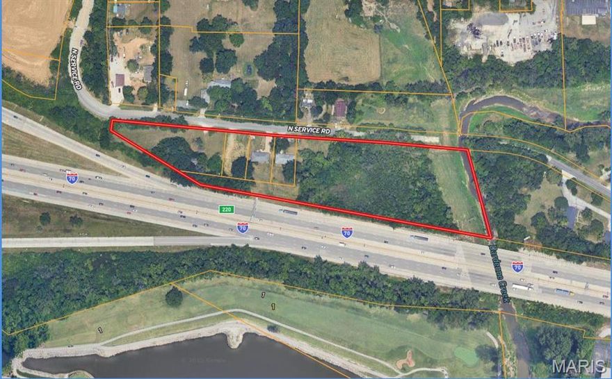 5.51+/- acres of commercial ground along highway 70 with light industrial zoning approved.