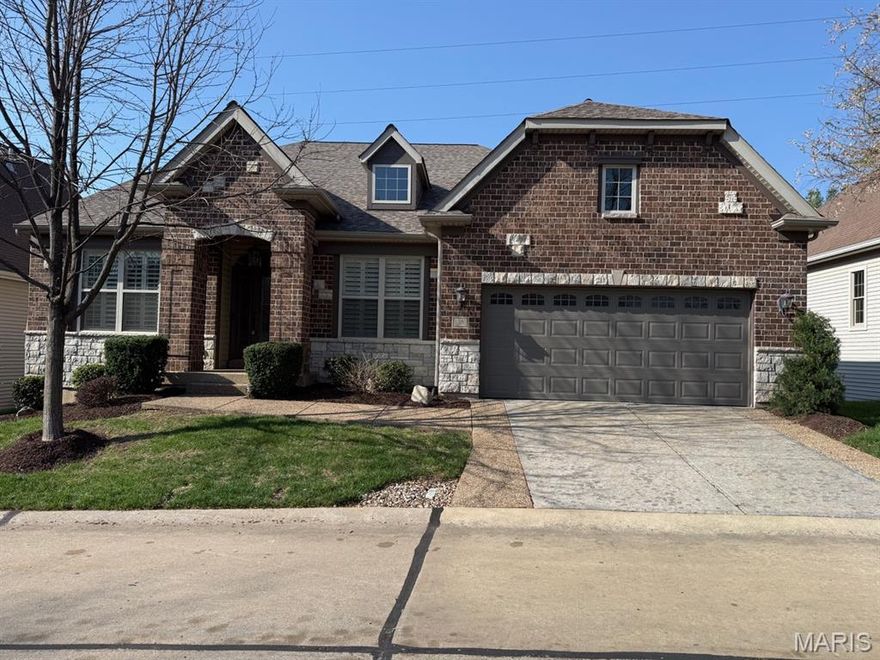 GORGEOUS 5 Bedroom 3 Bath Villa, covered front porch and Freshly painted a Neutral color through out, upgrades galore on this home! On one side, a flex room - use it to work or study from home, or utilize as another bedroom. Just past the flex is the switch back staircase to lower level and the formal dining room with coffered ceiling. A wide open, main floor with sprawling great room & spectacular kitchen with soaring 12 foot ceilings pour in natural light. You will love the gigantic center island, closed-off pantry and extensive cabinet and counter space. Spacious bedrooms including a sizable, private owner's suite with walk-in closet and private bath. Main floor laundry and mud room are modern conveniences every busy household will enjoy. The lower level offers 3 additional rooms, a full bath, media center, bar area, and still plenty of unfinished space for storage! Large tandem 3 car garage. Access to the Katy Trail, highways, shopping, dining & schools.