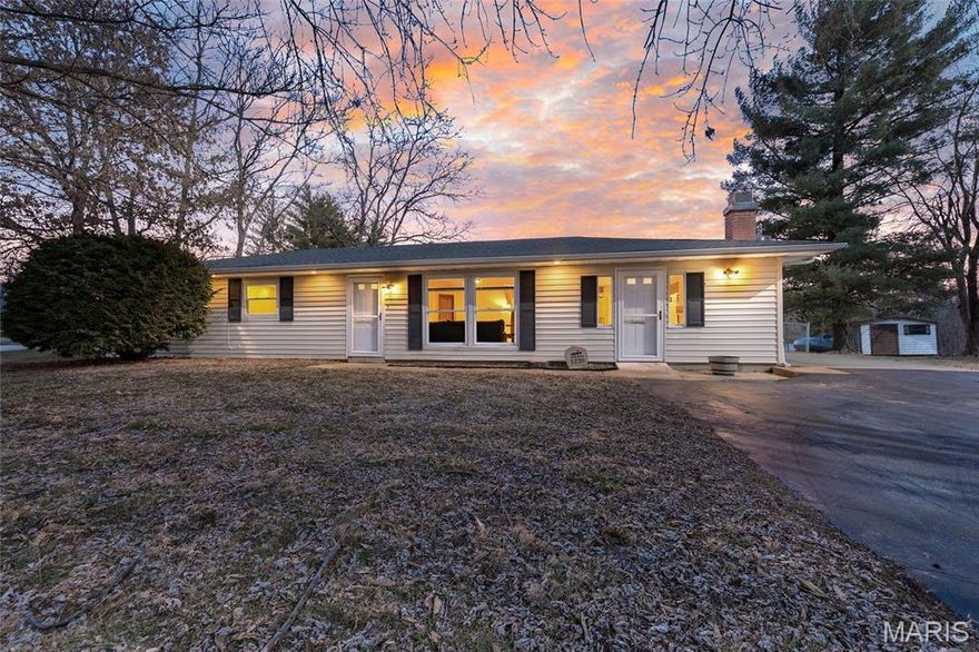 Space to Breathe, Minutes from Wentzville!  
Looking for a little more room without giving up convenience? This 3-bedroom, 2-bath home sits on over a half acre  and offers a peaceful setting with views of a wooded backdrop—all just a short drive from shopping, dining, and everyday amenities in Wentzville.
Inside, you’ll find a functional layout with both a living room and a separate family room, giving you options for gathering, relaxing, working from home, or creating a space that fits your needs. The wood-burning fireplace adds a cozy focal point and a touch of character to the main living area.
The updated kitchen features classic white shaker cabinets, stainless steel appliances, granite countertops, and plenty of cabinet and counter space, blending style and practicality. Main floor laundry adds everyday convenience.
One of the standout features is the enclosed porch that includes its own air conditioner, offering additional usable space throughout much of the year. Whether you’re enjoying a quiet morning or unwinding at the end of the day, it’s a comfortable spot to take in the view of the oversized backyard.
Outside, the generous lot provides open space for outdoor activities, gardening, entertaining, or simply enjoying the setting. A shed offers additional storage for tools and equipment.
If you’ve been searching for a property that offers outdoor space, flexible living areas, and easy access to town, this home is worth a look.  Recent Upgrades to the property include: new septic tank and aerorater disconnect box, termite treatment around perimeter of home, a/c and furnace check up, new ceiling fans, new GFCI outlet and vent fan in main bathroom, new Hague Iron Master Filter, new roof in 2023 on house and shed, new whole house water filter, new duel bathroom switch, new flood lights in front and back of house, water softener checkup, new dual reverse osmosis system and garbage disposal (not installed but will be left with property).