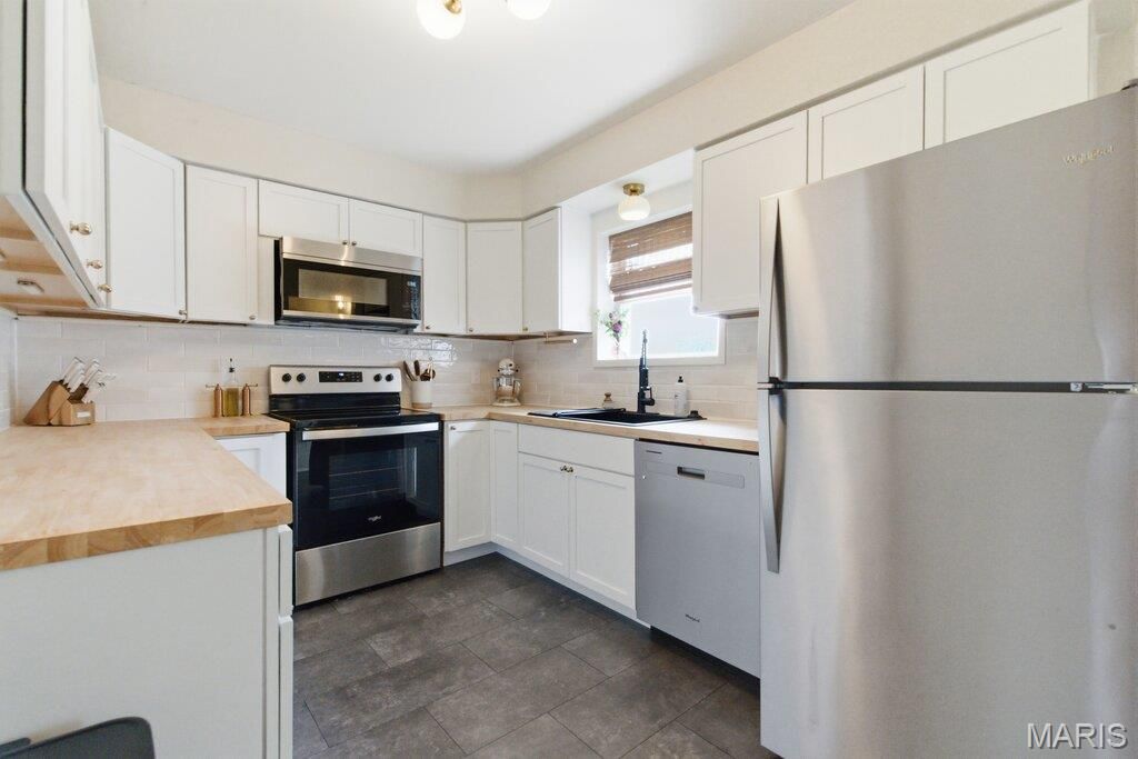 Photo of 9304 Aster Avenue, Affton, MO 63123 (MLS # 26019065)