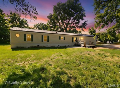 Photo of 400 W Ruby Street, Conway, MO 65632 (MLS # 26030446)