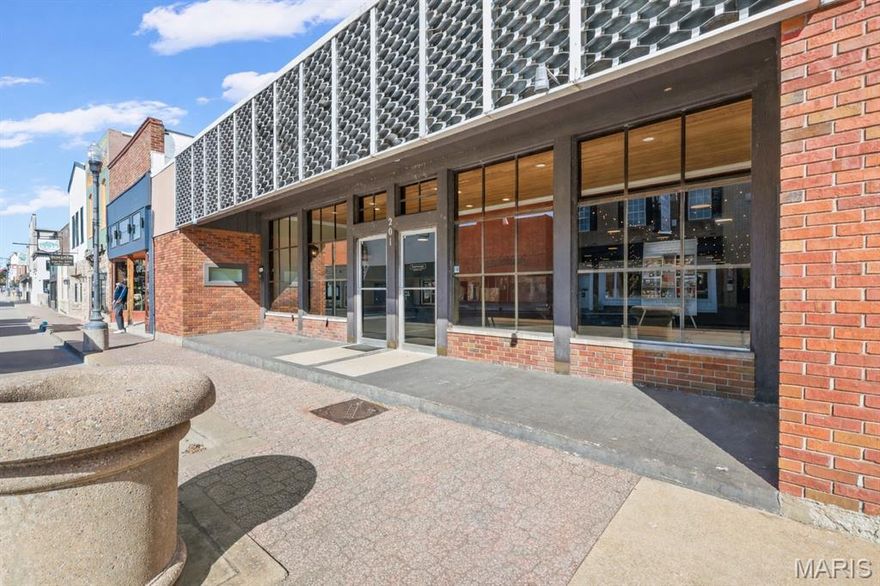 Right in the heart of Historic Main Street in downtown Festus, this 6,000+ square foot commercial building at 201 E Main St offers location, presence, and possibility all in one. Surrounded by local shops, restaurants, and community events, you’re stepping into an address that already carries recognition and steady foot traffic.  Inside, the space is primed for its next chapter. A full commercial kitchen and bar are already in place, giving restaurateurs and hospitality investors a serious head start. The expansive layout, soaring ceilings, and open-concept design create flexibility for a high-energy restaurant, brewery, event venue, entertainment concept, or even a dynamic retail or office space!
The character of Historic Main Street brings built-in charm — while the interior offers the scale and infrastructure to execute your vision without starting from scratch. As Main Street Festus continues to grow and attract new energy, this property positions you in one of the most visible and recognizable commercial corridors in town. Whether you’re an owner-operator or an investor looking for your next strategic acquisition, the opportunity here is both practical and powerful! If you’ve been waiting for the right commercial investment — this might be it!