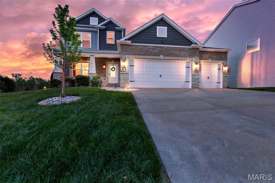 Welcome home to this beautifully maintained and thoughtfully updated 2-story in Wentzville. With 4 bedrooms, 3 baths, this home offers a functional layout with space for everyone. The inviting living room features a stunning stone gas fireplace and an exposed split staircase with wrought iron spindles that makes a strong first impression. Just off the kitchen, the hearth room adds warmth and character with classic wainscoting. The kitchen is designed for both everyday living and entertaining, complete with stainless steel appliances, a large center island with breakfast bar, walk-in pantry, stone backsplash, and under-cabinet lighting. Upstairs, you’ll find a versatile loft space with a stylish fandelier, along with all four bedrooms including a spacious primary suite featuring dual vanities and a large walk-in shower with recessed shelving and built-in seating. Step outside to enjoy the large backyard, stamped concrete patio, and maintenance-free composite deck with iron railing. Additional highlights include a walkout basement, PEX master control plumbing system, partially insulated 3-car garage, and major updates including roof (2023), siding (2024), irrigation system (2023), upstairs LVP flooring (2022), and upgraded lighting (2023). Located in the Wentzville School District and served by Wabash Elementary, this home checks all the boxes.