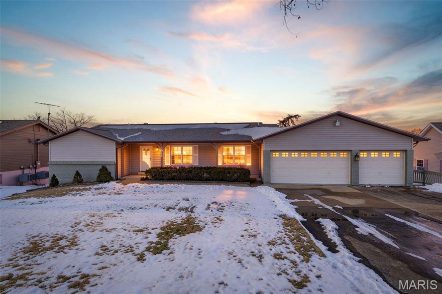 Fantastic family getaway spot or make this your full time residence!  This fabulous lake home on Lac Marseilles in Terre Du Lac.  This home features 3292 finished sq ft of living space and includes a main floor primary suite with nice view of the lake, a large open living area with a wood burning fireplace.  A large kitchen with plenty of counter space .  There is a walkout to a main floorscreened in deck for some outdoor dining.  The lower lever also features a wood burning fireplace, large living area, an included pool table with accessories for family game night, a second full kitchen , 2 large bedrooms and a full bath .  Then you walk outside to alarge deck and steps leading down to the covered boat dock and waterfront area where you can swim, fish and relax.  This is located on a skiable lake for all your water play time with family and fiends.  There is an oversize 2-3 car garage with plenty of room for cars, and other toys as well.  This home is located in a private community with stores, gas station, bank, resturaunt, parks, and lots of community events for year round fun for all.