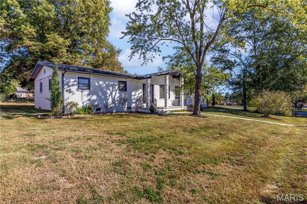 Photo of 302 Moore Street, Dexter, MO 63841 (MLS # 26067555)