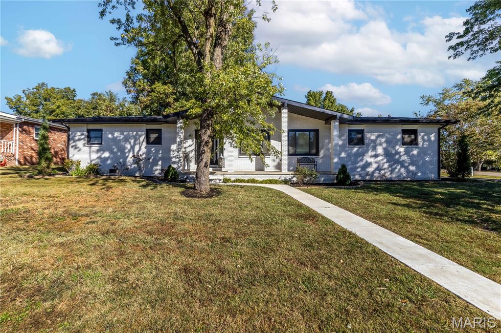 Photo of 302 Moore Street, Dexter, MO 63841 (MLS # 26067555)