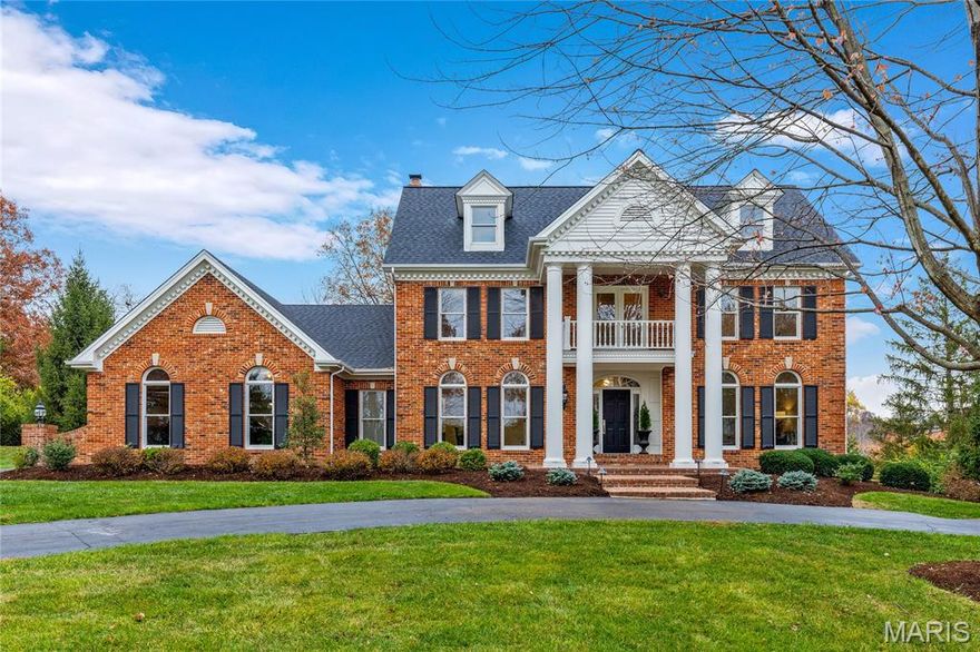 Spectacularly renovated and thoughtfully updated, this DeShetler-built Georgian Colonial blends timeless architecture with today’s most desirable upgrades. Extensive improvements include rich oak hardwood flooring, newly installed carpeting, custom-designed kitchen and baths, all-new Andersen windows throughout, and significant mechanical and system updates—providing both refined style and peace of mind. A wide brick porch accented by architectural columns and an upper balcony creates a grand first impression. Inside, a dramatic two-story marble foyer welcomes you, flanked by elegant formal living and dining rooms featuring crown molding and full-height windows that flood the home with natural light. The family room exudes warmth and character with a 10' beamed ceiling, designer lighting, gas fireplace and atrium doors opening to the patio for seamless indoor-outdoor living. Designed for both everyday living and entertaining, the chef’s kitchen showcases quartz countertops, custom Shaker-style cabinetry, Sub Zero and Thermador appliances, and a stunning 9-foot center island. The adjoining breakfast room features a wide bay window and custom built-ins, creating an inviting casual dining space. A sweeping oak staircase leads to the spacious primary suite with two walk-in closets and a luxurious bath highlighted by a freestanding soaking tub. Three additional bedrooms and a full hall bath complete the second level. Situated on picturesque 1.2-acre park-like grounds, the property also features a brick patio, circular drive, and a three-car garage—offering privacy, functionality, and exceptional curb appeal. With extensive renovations and valuable system updates already completed, this home is truly move-in ready.