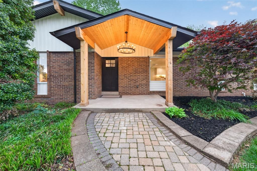 Photo of 1115 Grand Prix Drive, St Charles, MO 63303 (MLS # 26025930)