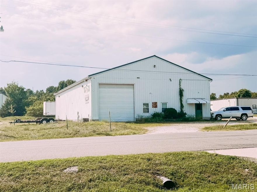 GREAT LOCATION ON TWITTY DRIVE.  4000 SF M/L SHOP BUILDING WITH OFFICE AND HALF BATH.  ADDITIONAL ROOMS ABOVE THE OFFICE COULD OFFER MANY OPTIONS FOR YOU.  TWO 14 FOOT ROLL UP DOORS. ONE ON SIDE AND ONE IN BACK, LARGE ENOUGH TO DRIVE A ROAD TRACTOR INTO SHOP.  OFFICE HAS CENTRAL HEAT AND AIR CONDITIONING.  SHOP HAS HEAT AVAILABLE.  FLOOR DRAINS IN THE FLOOR.  COUNTY WATER AND SEWER WITH INTERCOUNTY ELECTRIC.  SO MANY POSSIBILITIES WITH THIS BUILDING. START PLANNING YOUR ENTERPRISE TODAY!