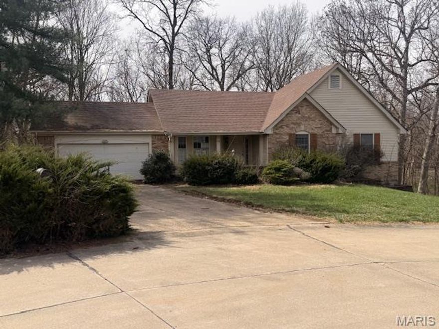 Check out this home with a view! Lake St. Louis home with lake rights and easy access to dock slips at Marina. Enjoy your view from the screened porch or snuggled up as you watch a movie on the couch. Possible additional 3rd and 4th bedroom sleeping areas. Located on quiet cul-de-sac with wooded lot too for privacy. Spacious home with partially finished basement great for entertaining. 

HUD listing sold in as-is condition (Case #292-516186). Insurability Status (IE). Property sold AS IS with all faults. Please visit www.hudhomestore.gov for escrow amounts, 203K financing eligibility, and bidding instructions. Room sizes are approx. Please bring flashlight as power is not turned on. Buyer is responsible for turning on utilities for inspection. An equal housing opportunity