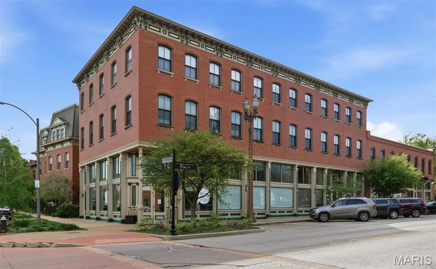 City living, elevated. This 2-bedroom, 2.5-bath condominium at 1912 Park Ave offers 2,166 square feet of thoughtfully designed space in the heart of Lafayette Square, one of St. Louis's most walkable and vibrant historic neighborhoods.
Step inside and the space opens up beautifully. Soaring ceilings, rich hardwood floors, and oversized picture windows facing Park Avenue put the energy of the neighborhood right at your fingertips. The kitchen is built for the home cook who entertains as well: stainless steel appliances, oversized cabinetry, and generous counter space to match. A gas fireplace anchors the living area and sets the tone for cozy evenings in.

Out back, two private decks (one on each floor), overlook a serene community terrace. The larger deck, strung with twinkle lights, is the kind of spot that turns an ordinary evening into something worth savoring. Upstairs you'll find that the primary suite is a genuine retreat. Spacious and well-appointed, with a walk-in closet and a bath designed to help you decompress after a full day. The second bedroom offers flexibility for a guest room, home office, or both. Elevator access to the unit, secure storage, and your own private over-sized 1-car garage round out everything you need for easy city living. And then there's the neighborhood right out your front door. Lafayette Square surrounds you with tree-lined streets, beautifully restored painted ladies, and the 30-acre Lafayette Park, the oldest urban park west of the Mississippi. Award-winning restaurants, boutique shops, a farmers market, free summer concerts, and First Friday gallery nights are all within walking distance, along with easy access to downtown, Soulard, Tower Grove, and beyond. This is more than a condo. It's a lifestyle.