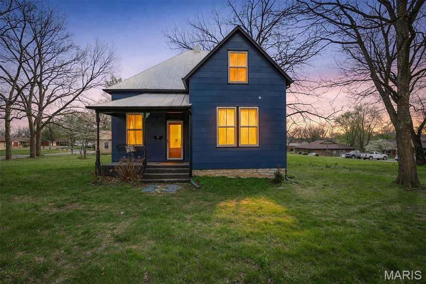 Charming, beautifully updated historic home in Ste. Genevieve! This 4-bedroom, 1-bath home offers the perfect blend of character and modern updates, all situated on a large lot with mature trees on a quiet street. Inside, you'll find 9' ceilings, original millwork, and gorgeous hardwood floors that highlight the home's timeless appeal. The kitchen was remodeled just a few years ago and features stainless steel appliances, butcher block countertops, exposed brick, and a subway tile backsplash. The bathroom has also been tastefully updated while maintaining the home's historic charm. Enjoy the inviting front porch, spacious yard, and the peace of mind that comes with a recently coated standing seam metal roof, along with additional updates throughout. Move-in ready and full of character, this Ste. Genevieve home is one you won’t want to miss. Sellers would be open to selling the house with the furniture! Schedule your showing today!