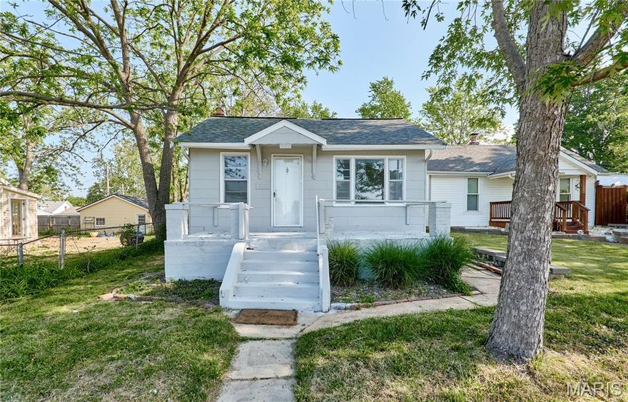 A perfect blend of charm and simplicity, this home is ready for its next chapter. This 2 bedroom, 1 bath bungalow has been freshly painted inside and out, with professionally cleaned and refinished flooring that adds warmth throughout. A bright and spacious family room welcomes you just off the entry, offering a flexible layout perfect for both living and dining. The refreshed bathroom features a newly resurfaced tub, while the kitchen offers classic oak cabinetry, a gas range, dishwasher, and cheerful blue countertops that bring a fun pop of color to the space. Two comfortable bedrooms complete this inviting floor plan, ideal for those seeking a cozy place to call home.