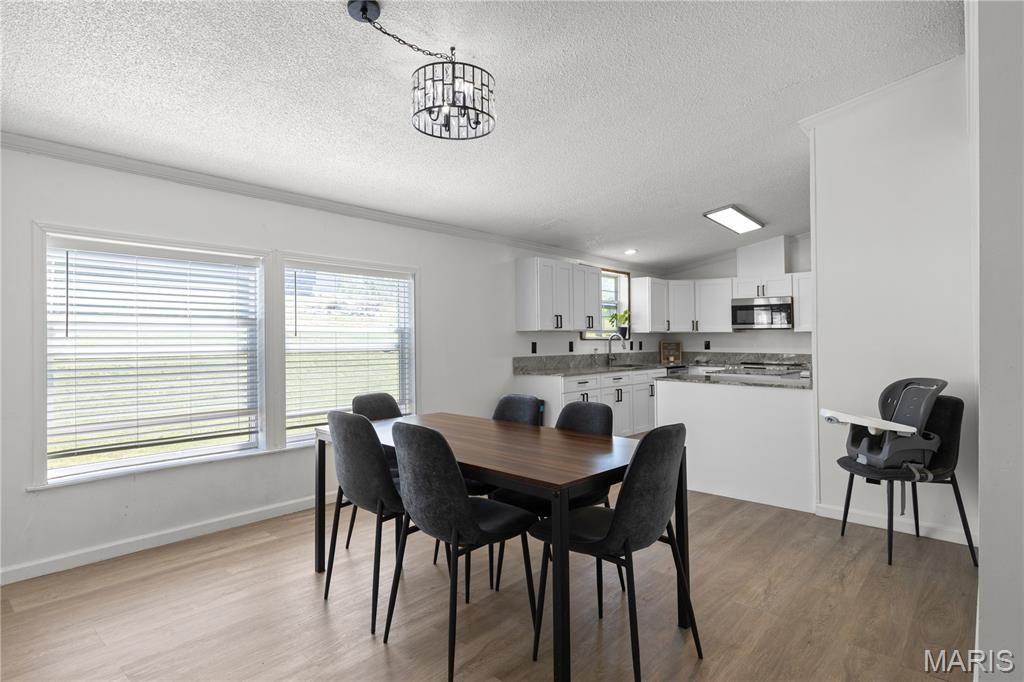 Photo of 410 Julie Court, Elsberry, MO 63343 (MLS # 26018276)