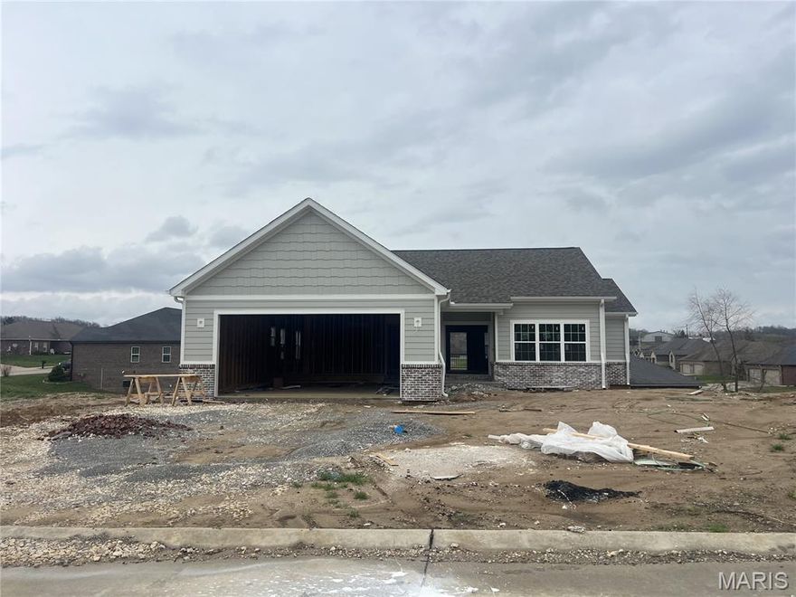 New construction located in Baldwin Farms Subdivision. Built by Forefront, this 3 bed 2 bath home offers a bright, open floorplan. The kitchen has granite countertops, shaker style cabinets, and a large center island, plus a split floor plan with main level laundry and primary ensuite. Dining area overlooks a covered deck, perfect for entertaining and enjoying beautiful days. Full unfinished walk out basement for storage and room to grow. With easy access to I55, this home is ideal for those looking for a tranquil and modern living space with a convenient location.