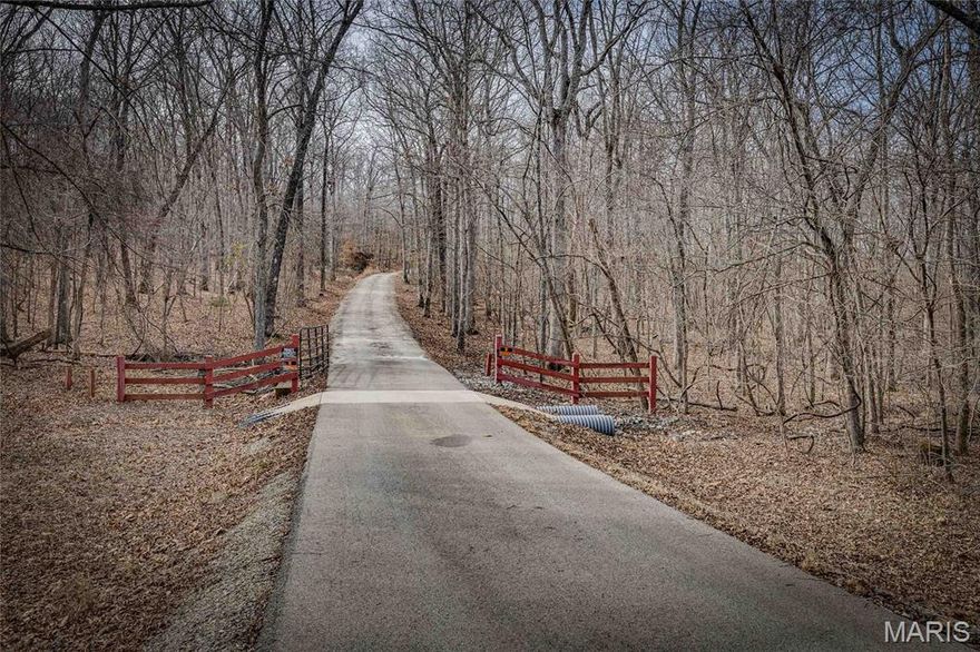If you have been waiting for serious acreage in Farmington with room to truly spread out, this property delivers.

Situated on approximately 75 acres with a pond, this 1994-built property offers space, flexibility, and infrastructure that is hard to find. Including the separate apartment-style living area, the home offers approximately 6,500 square feet with a total of 6 bedrooms and 5.5 bathrooms. This is not just a house. It is a full setup.

The main residence provides generous living space and includes a wood-burning stove for cozy evenings and practical supplemental heat. In addition, there is a separate living area set up as an apartment complete with its own living space and wood-burning stove. Whether you need multi-generational living, guest quarters, or private retreat space, the flexibility is already built in.

And yes, we need to acknowledge the wood-burning stove situation.

The main house has one. The apartment has one. The attached garage has one. Even the small cabin has one. That makes four total. If you appreciate backup heat or simply enjoy the comfort of a real fire, this property is well prepared.

The attached garage features two overhead doors and has enough space to accommodate up to 12 vehicles. Whether you have trucks, recreational vehicles, equipment, or simply value serious storage space, this garage can handle it.

Now let’s talk about the barn. It is large, functional, and built for real use. The barn includes two horse stalls that can be opened into a larger birthing stall if needed. It also features an overhead garage door for easy access and a bathroom inside the barn itself. The barn roof was replaced in 2018. This is not a small outbuilding. It is a substantial structure ready for livestock, equipment, or hobby farming operations.

The approximately 75 acres provide room for horses, cattle, hunting, trail riding, recreation, or simply enjoying privacy. A pond enhances both the scenic setting and practical use of the land.

In addition, there is a small cabin on the property that could serve as a hunting cabin or future project space, adding even more versatility.

Properties offering 6,500 square feet, 6 bedrooms, 5.5 bathrooms, a garage that fits up to 12 vehicles, a large barn, additional living quarters, acreage, and a pond in Farmington are not common. This is an opportunity to own space in every sense of the word.