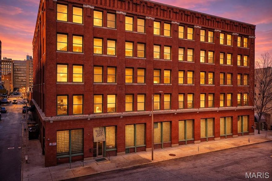 Welcome to this stunning penthouse loft offering over 3,000 sq ft of open, industrial-chic living in the historic Elder Shirt Lofts! This expansive 2-bed, 2-bath residence showcases soaring ceilings, exposed brick, rich wood beams, and oversized windows that flood the space with natural light, creating a true urban retreat. The impressive open floor plan is designed for both everyday living and entertaining, featuring a stylish kitchen with stainless steel appliances, solid surface countertops, and a breakfast bar that flows seamlessly into the spacious living and dining areas. The primary suite offers a private escape with a walk-in closet and en-suite bath, while the second bedroom features its own private loft area perfect for a unique sleeping space, office, or creative retreat. Enjoy the rare luxury of your own private rooftop patio, ideal for relaxing or entertaining with skyline views. Additional highlights include in-unit laundry, elevator access, storage space, and 2 assigned garage parking spaces. Located in the heart of downtown near City Museum, Union Station/St Louis Aquarium, America's Center Convention Complex, and the Enterprise Center, this is elevated city living with character, space, and unmatched access to St. Louis’ top attractions.