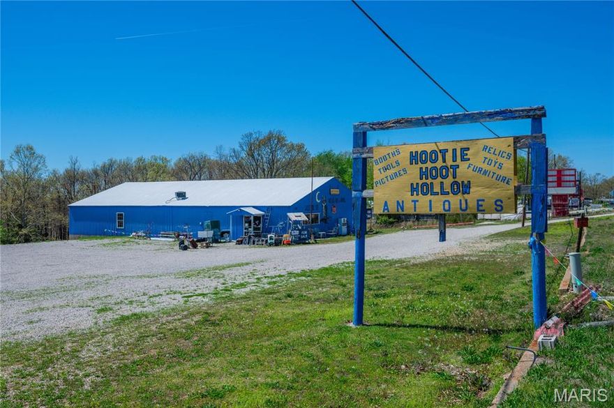 Welcome to Hootie Hoot Hollow! Situated just half a mile from the captivating Bennett Spring State Park, this exceptional commercial property spanning 4500 sq ft awaits your personal touch. Sitting on 2.34 acres and nestled along State Highway 64, only .5 mi away from Bennett Spring State Park, its prime location sets the stage for endless possibilities. Currently operating as an antique store, this versatile building can be transformed into anything. A restaurant, brewery, storage units, arcade, or even revived as a country music hall- reminiscent of its vibrant origins in the 80s. The property offers easy access for all, with its handicap accessibility features. While currently equipped with a single bathroom, the potential exists to convert it into four. The sky is truly the limit with this remarkable property, schedule your private showing today! Majority of contents can be purchased with property for $333k. A couple of vendor booths would be excluded.