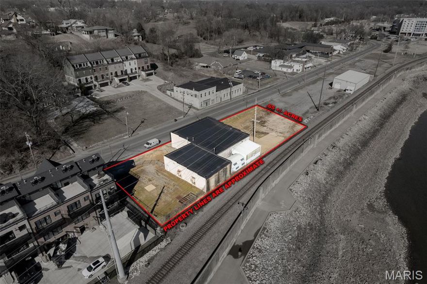 Location and visibility set this property apart. This prime riverfront commercial asset offers over 7,000 square feet of flexible space with three oversized overhead doors and an additional loading dock, making it well suited for a wide range of uses. Situated directly along the Mississippi River, the property presents exceptional potential for office, restaurant, warehouse, or mixed-use concepts. Convenient parking is available on both the north and south sides of the building, enhancing accessibility for staff and customers alike. Opportunities like this are rare so don’t miss the chance to secure a highly versatile riverfront commercial property.